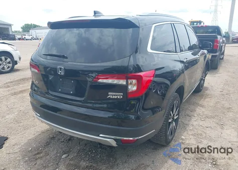 2021 Honda Pilot Awd Touring 8 Passenger from USA, damaged, VIN 5FNYF6H92MB000922